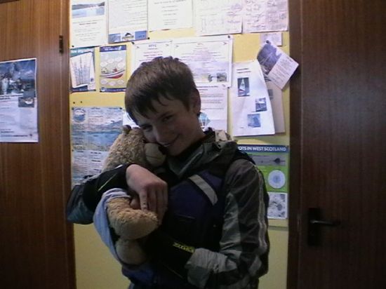 Angus giving Tesco Ted a loving hug